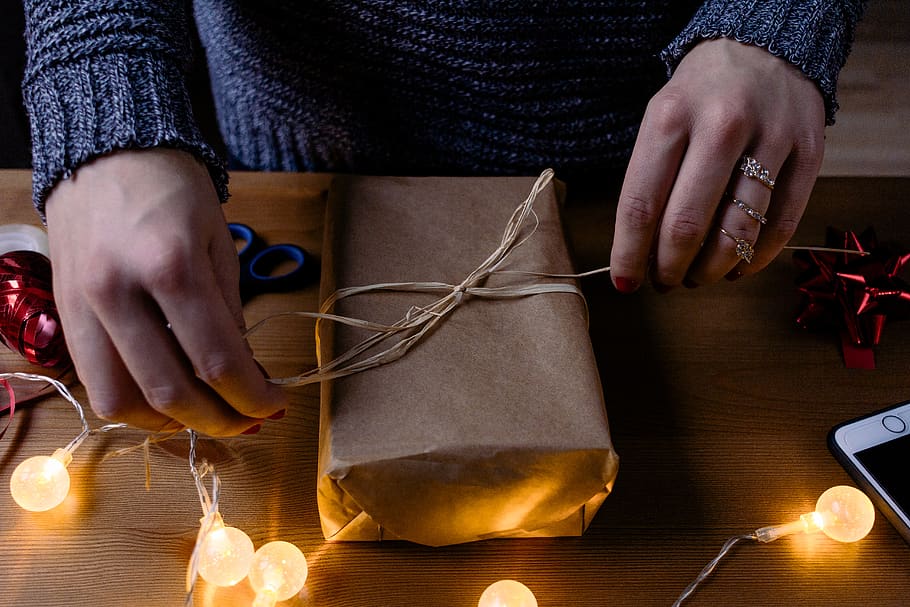 person tying brown box, bag, accessories, accessory, handbag HD wallpaper