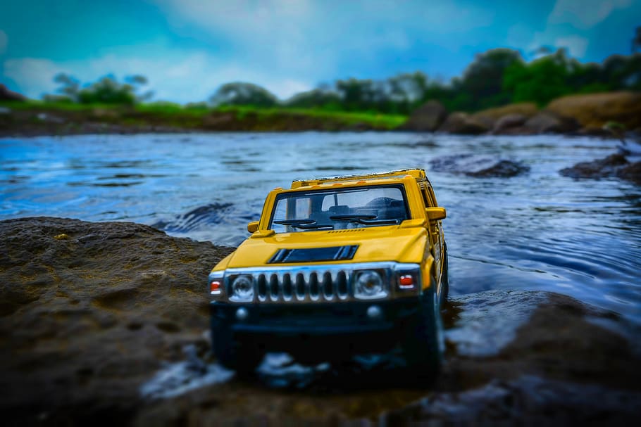 Yellow And Black Hummer Miniature, car, miniature toy, soil, water, HD wallpaper