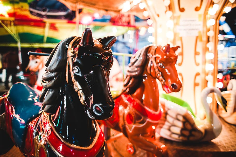 Traditional Carousel Horses on a Fun Fair Ride, carousels, funfair