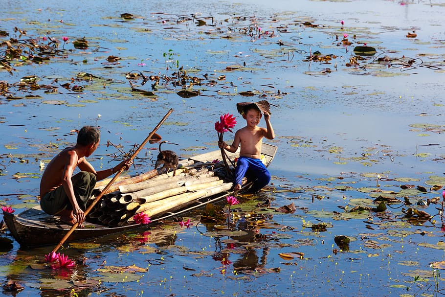 Two Men Riding Brown Boat, boy, canoe, child, dad, daddy, daylight HD wallpaper