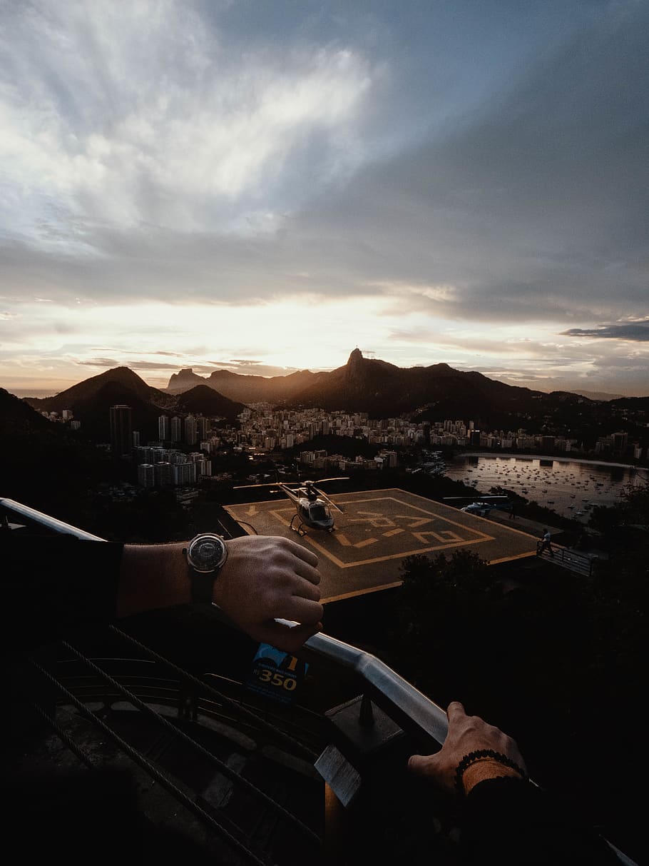 man looking at watch, sky, architecture, building exterior, built structure HD wallpaper