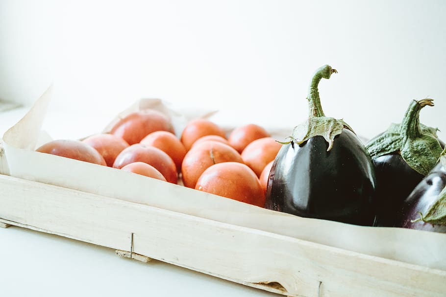 Close-up Photo of Purple Eggplants and Round Orange Fruits, box HD wallpaper