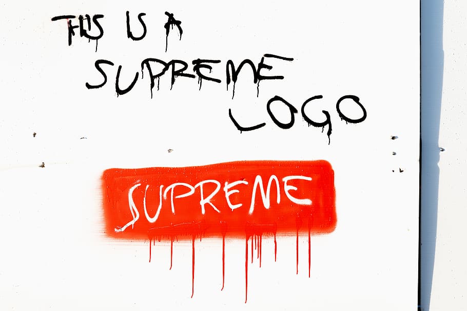 this is a Supreme logo text, communication, western script, red