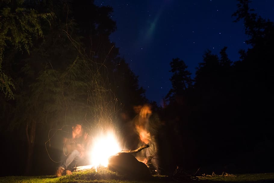 two people on a firepit, flame, bonfire, nature, camping, person HD wallpaper