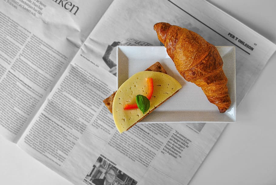 Croissant Bread and Sliced Cheese Placed on White Ceramic Saucer HD wallpaper