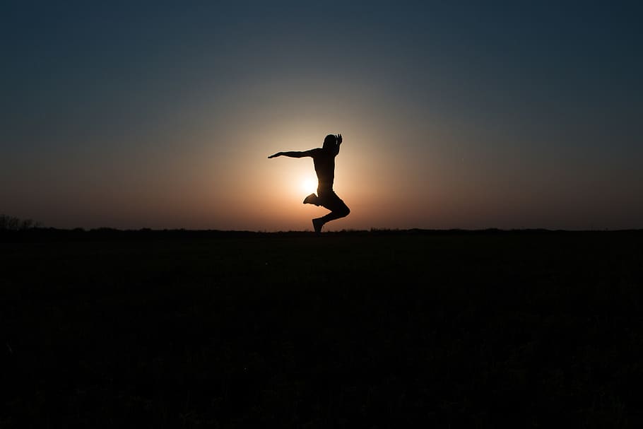 Silhouette Photo of Jumping Person during Twilight Hour, action HD wallpaper