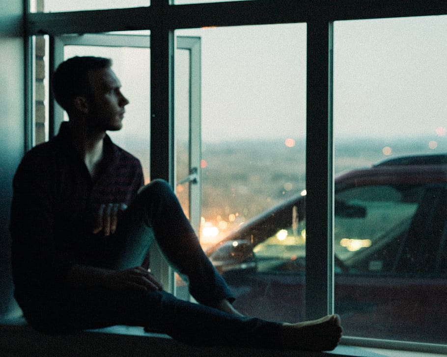man sitting beside window, one person, glass - material, transportation HD wallpaper