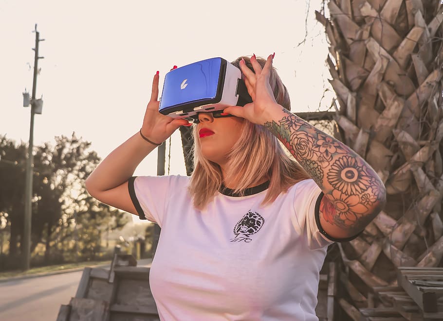 Photo of a Woman Using Virtual Reality Glasses, blur, close-up