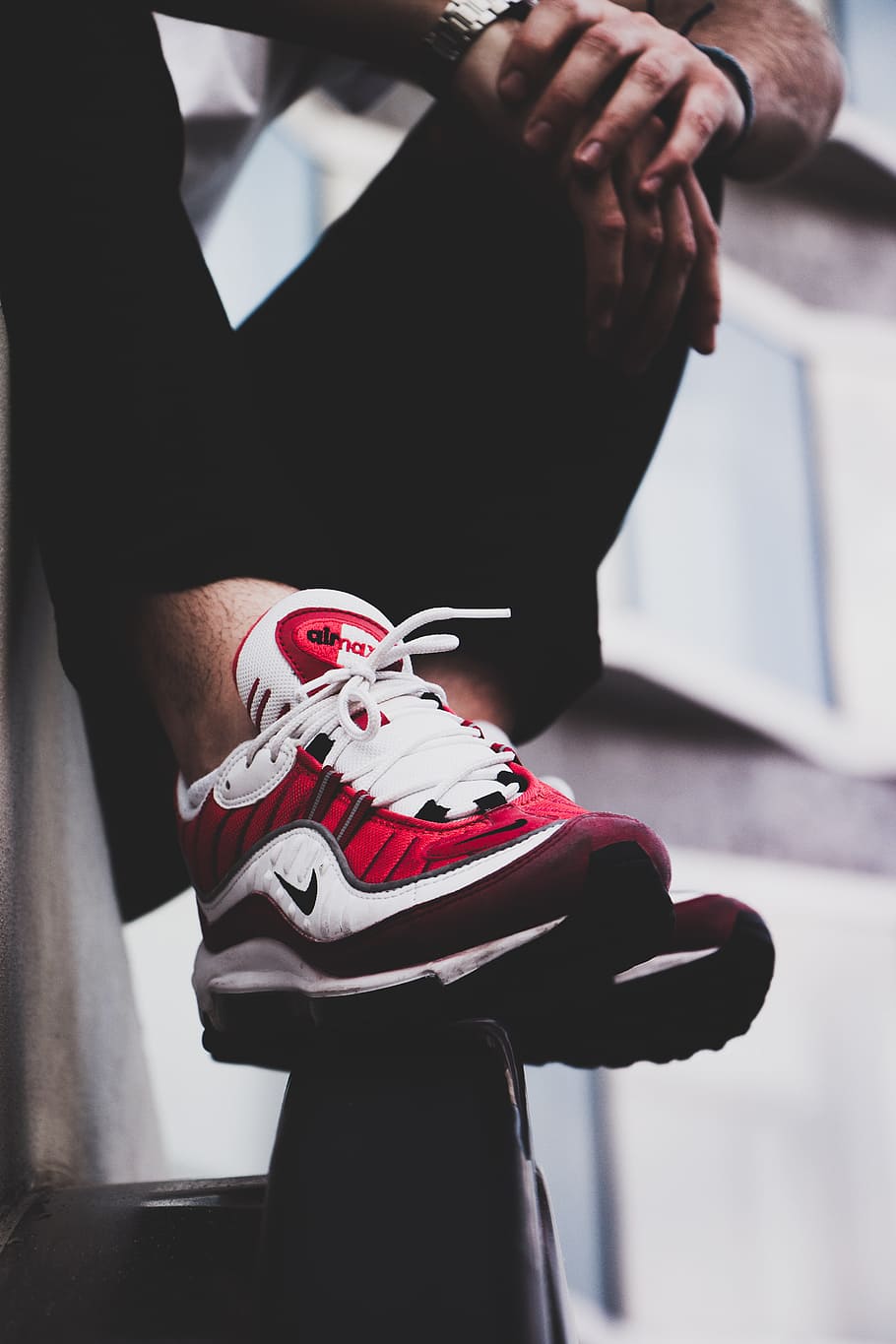 red-and-white Nike Air Max shoes\, photography, street, streetwear