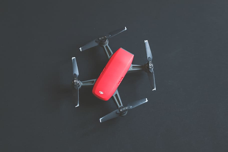 Red Dji Spark Drone, black background, camera, color, electronics HD wallpaper