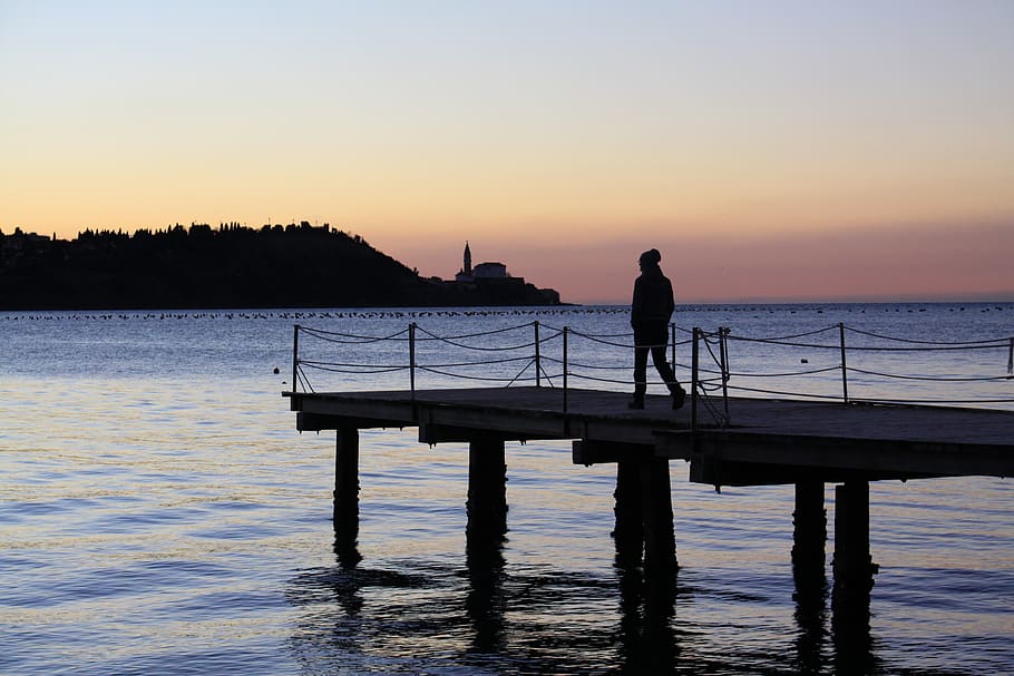 man standing on dock, view, ocean, slovenia, sunset, sea, water HD wallpaper
