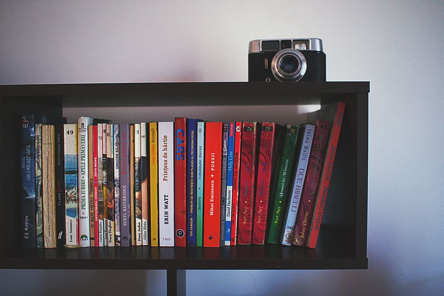 Black Wooden Shelf and Black Camera, book stack, bookcase, books HD wallpaper