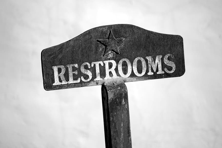 Restrooms signboard, symbol, logo, trademark, cross, monochrome