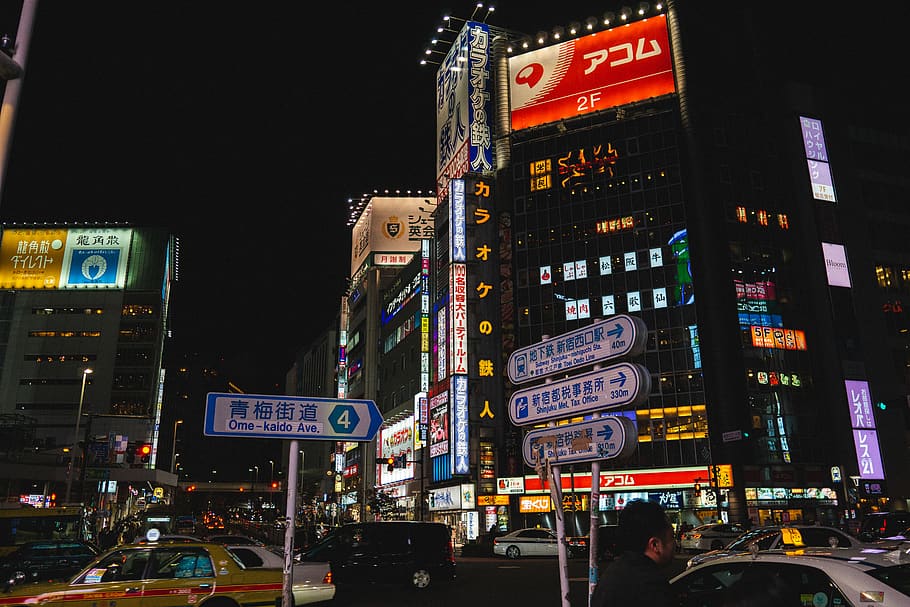 city during nighttime, urban, metropolis, town, building, person HD wallpaper