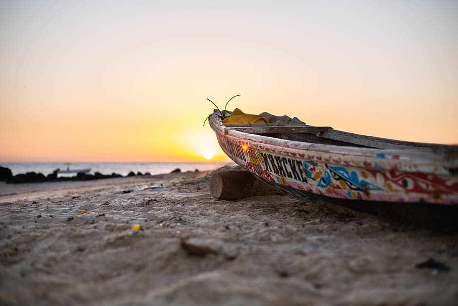 multicolored boat on brown sand, rowboat, vehicle, transportation