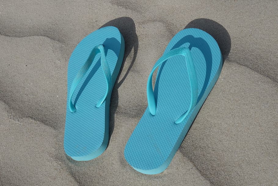 Blue thongs sitting on sand, flipflops, shoes, sandals, grains HD wallpaper