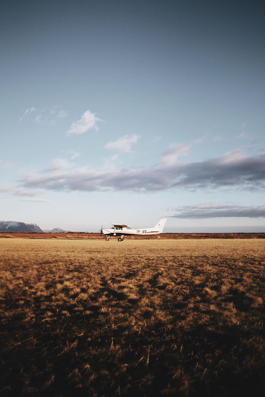 white airplane, airport, sunrise, small plane, iceland, gradiant