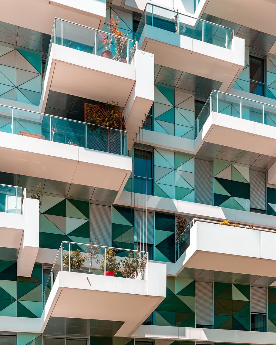 architectural photography of teal and white building, balcony HD wallpaper