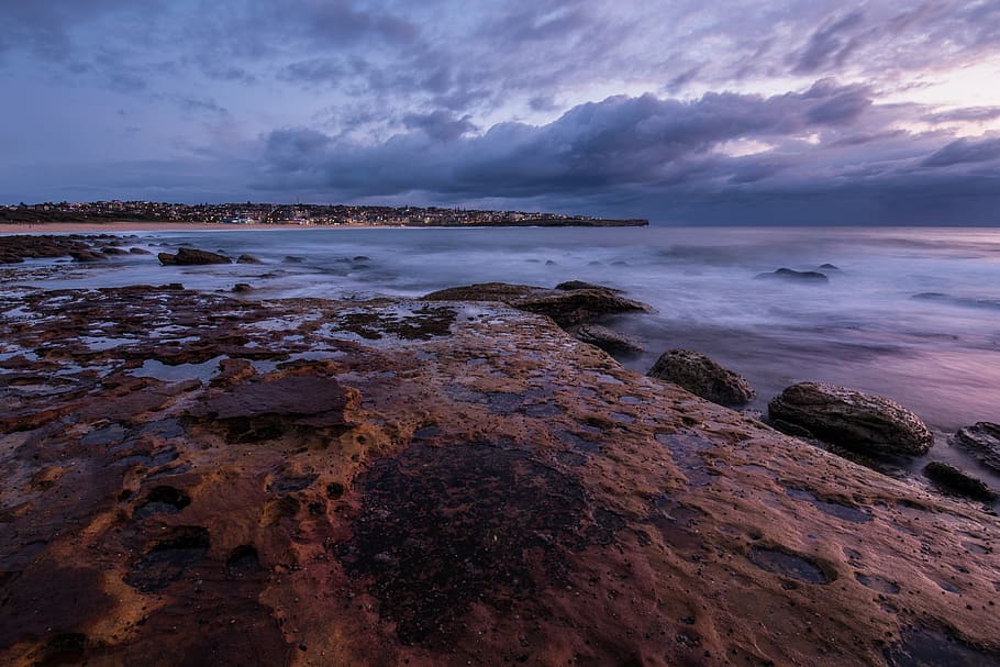 grey clouds over ocean and rock formations, sky, sea, water, scenics - nature HD wallpaper