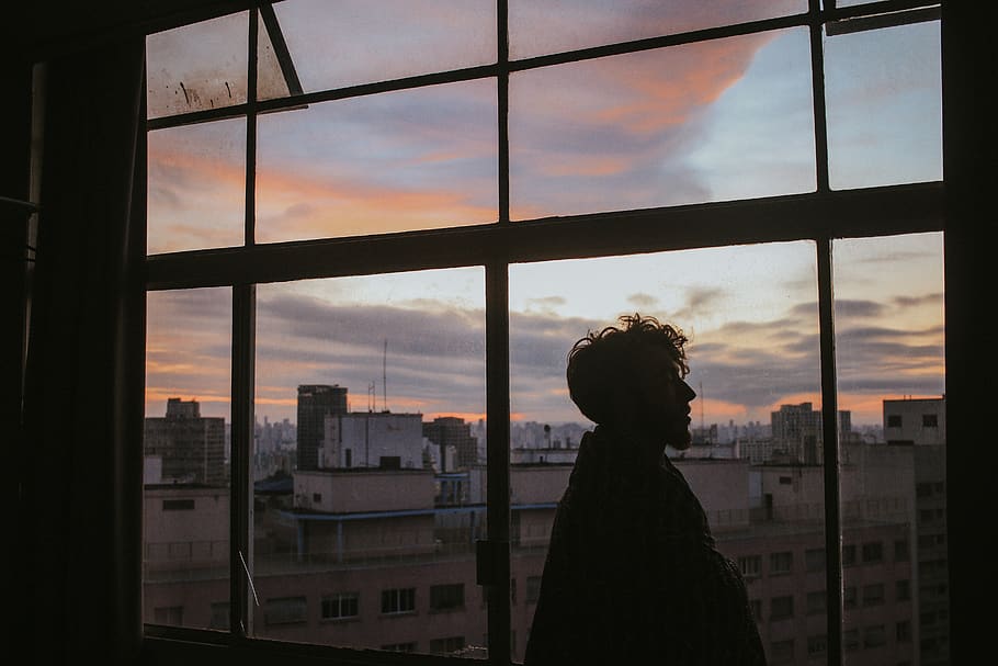Man Standing Near Glass Window Inside Building, architecture HD wallpaper