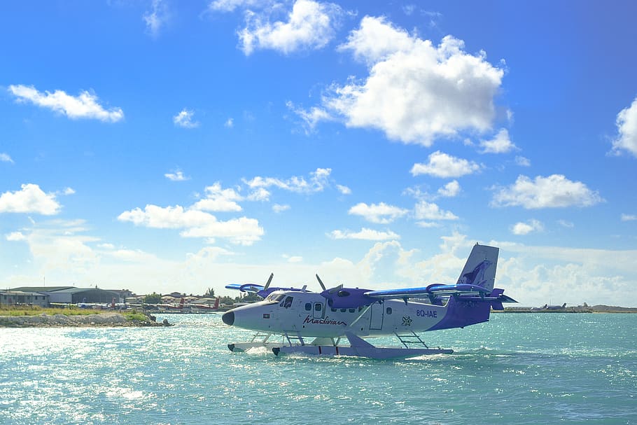 Parked Plane on Ocean, aircraft, aircraft wing, airplane, airplane wing HD wallpaper