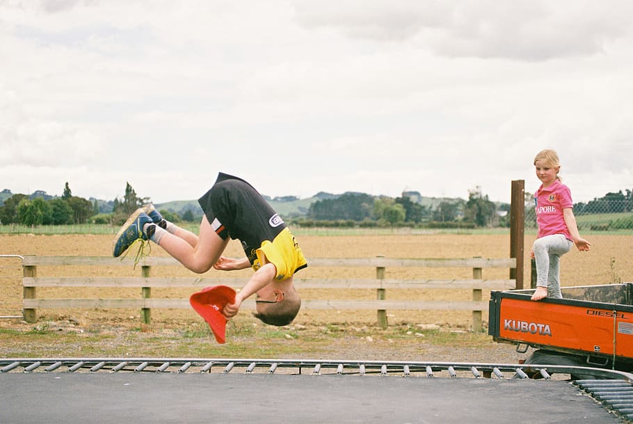 boy performing front flip, human, person, shorts, clothing, apparel HD wallpaper