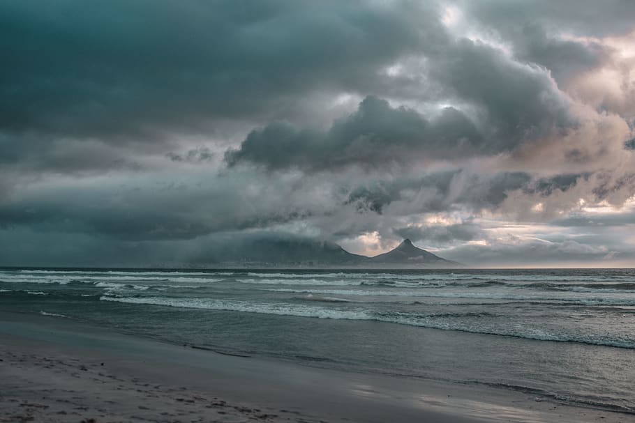 seashore across dark clouds, sky, cloud - sky, water, land, storm HD wallpaper