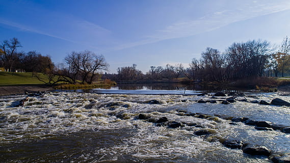 river, water, trees, fall, sky, blue, rapids, rocks, autumn HD wallpaper