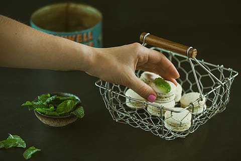 French macarons, sweet, human hand, one person, human body part HD wallpaper