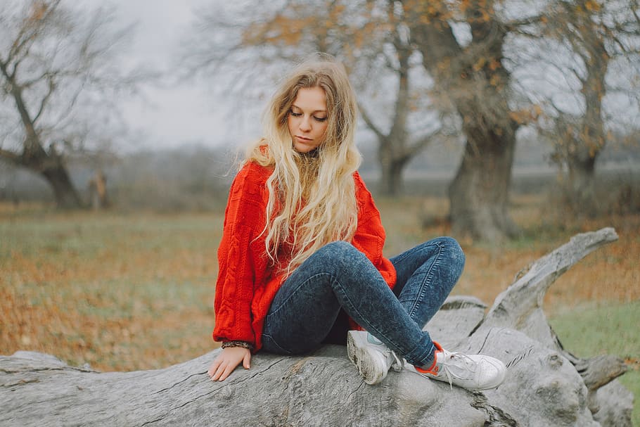 Woman in Red Sweater Sitting on Cutted Tree, beautiful, blonde hair