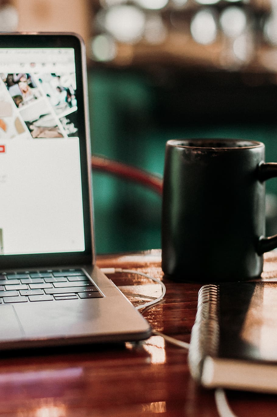 black ceramic mug beside laptop, table, technology, wireless technology HD wallpaper