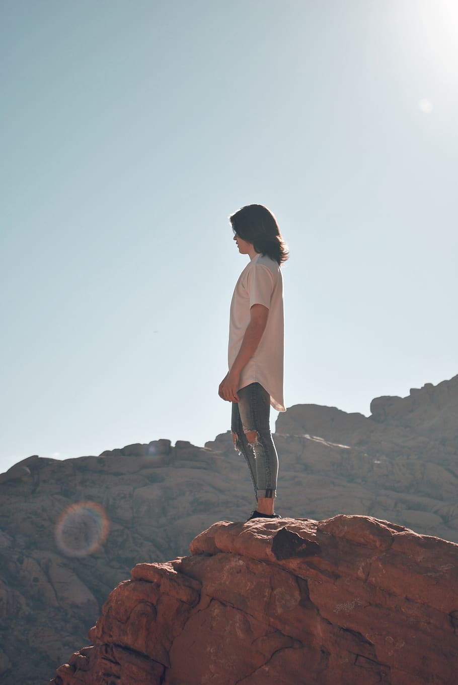 man standing on rock, human, person, clothing, apparel, outdoors HD wallpaper