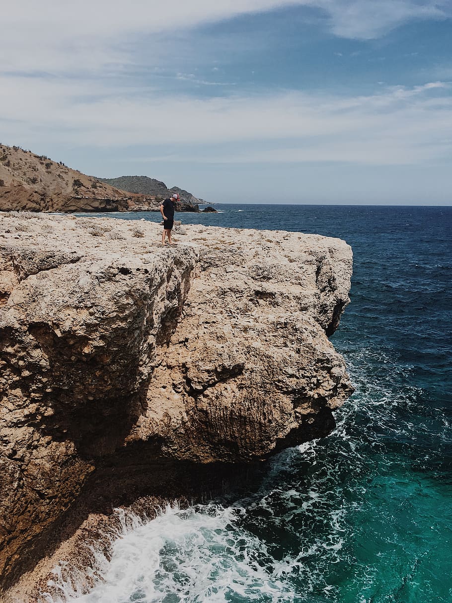 sea, water, rock, rock - object, solid, real people, beauty in nature HD wallpaper