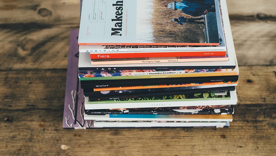 assorted-title softbound book on table, indoors, no people, still life HD wallpaper