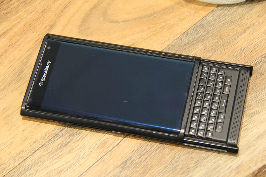HD wallpaper: slide out keyboard, phone on desk, priv, blackberry, smart  phone | Wallpaper Flare