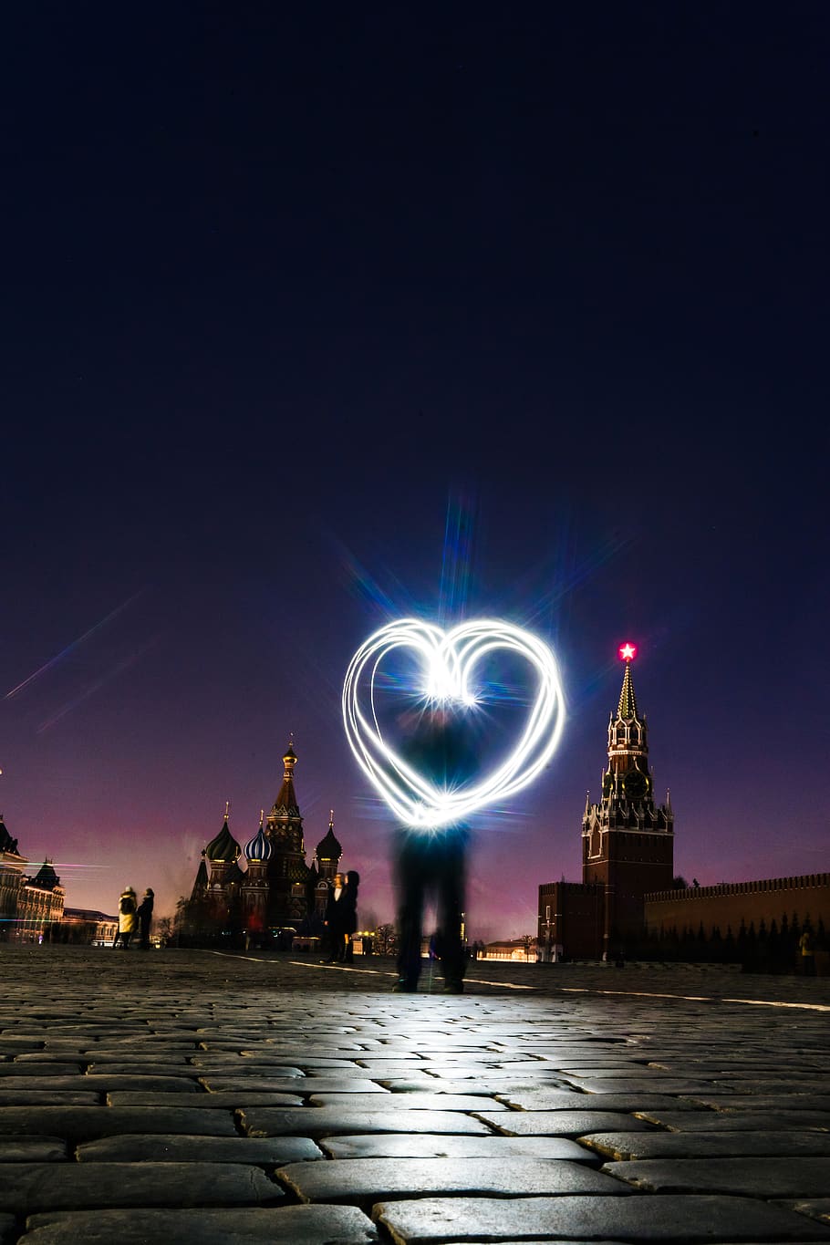 man forrming heart light, human, person, red square, moscow, russia HD wallpaper
