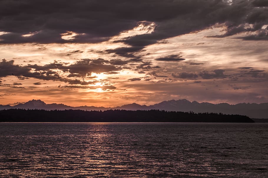 water, mountain, mountains, mountain range, sunset, clouds HD wallpaper