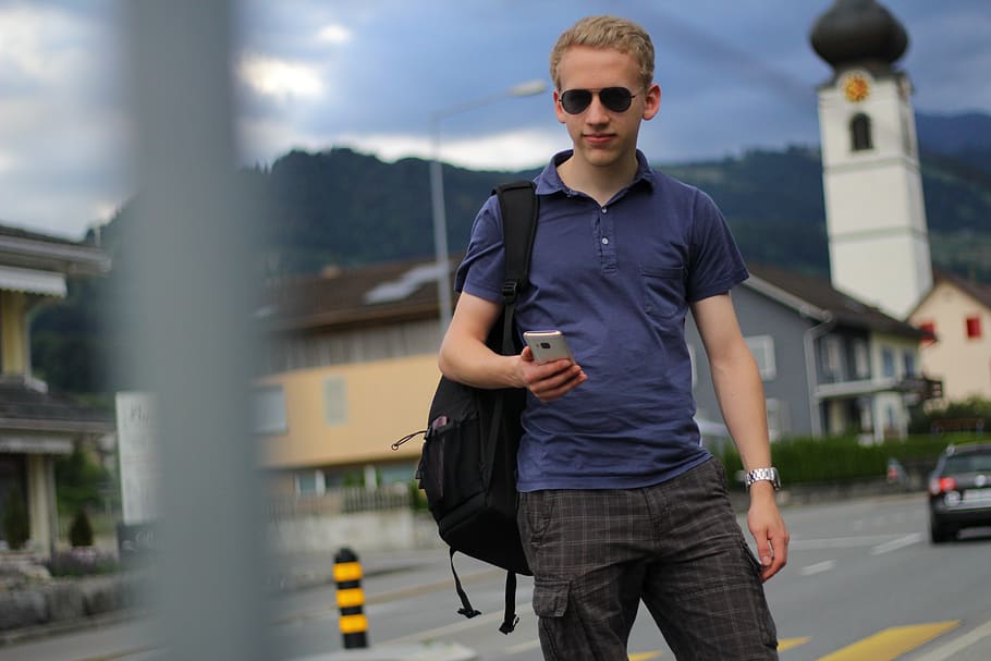 phone, looking on phone, polo, backpack, htc, htc one, clock HD wallpaper