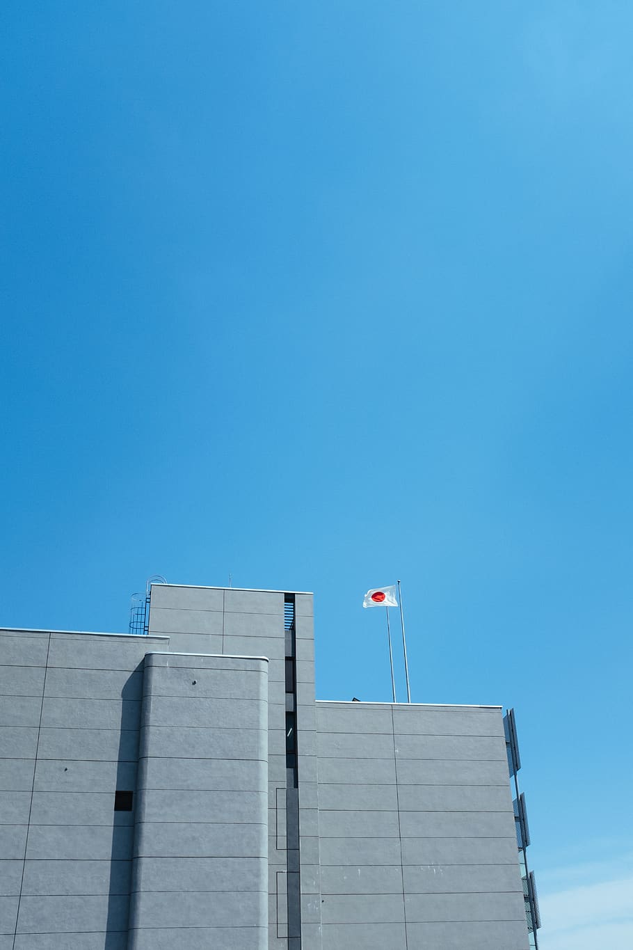 flag of Japan on top of building, tokyo, office building, city