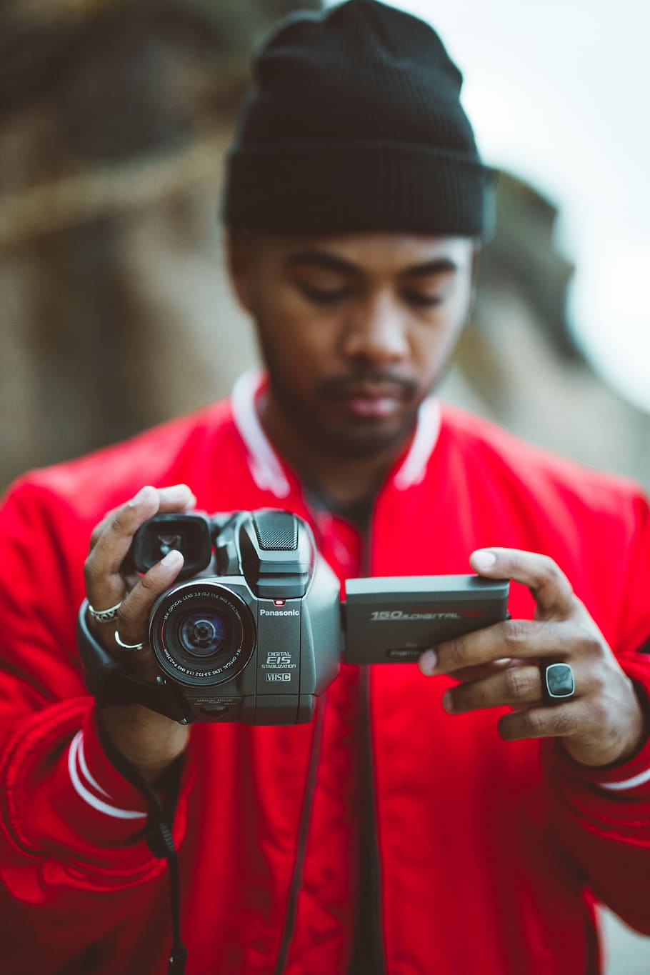 man holding camcorder, human, person, camera, electronics, finger HD wallpaper