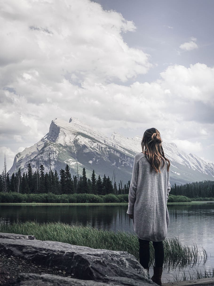 Woman Standing Near Rock in Front of Lake, clouds, female, landscape HD wallpaper