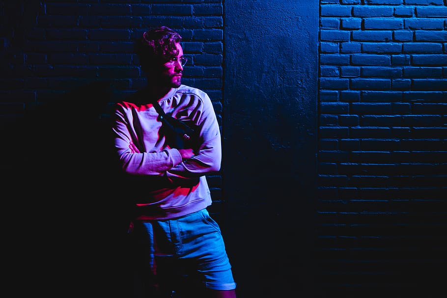man standing beside brick wall, person, human, people, netherlands HD wallpaper