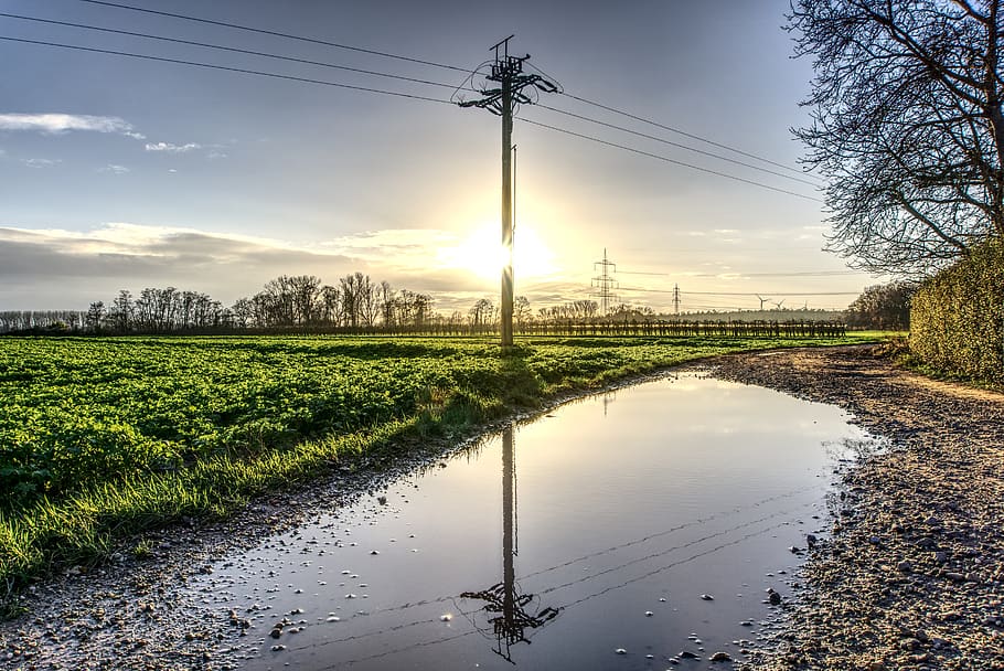 mirroring, strommast, power line, sun, backlighting, landscape HD wallpaper