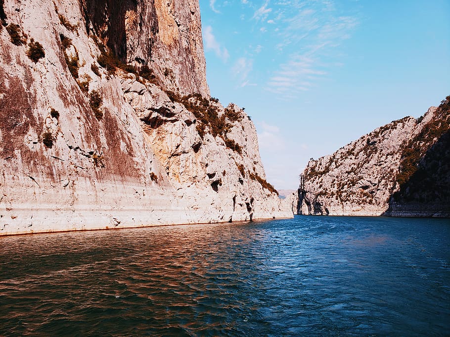 canyon, orange, blue, teal, water, rock, sea, beauty in nature HD wallpaper