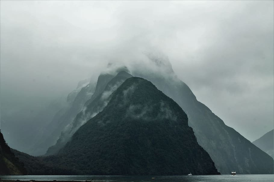 mountains covered with fog, nature, milford sound, new zealand