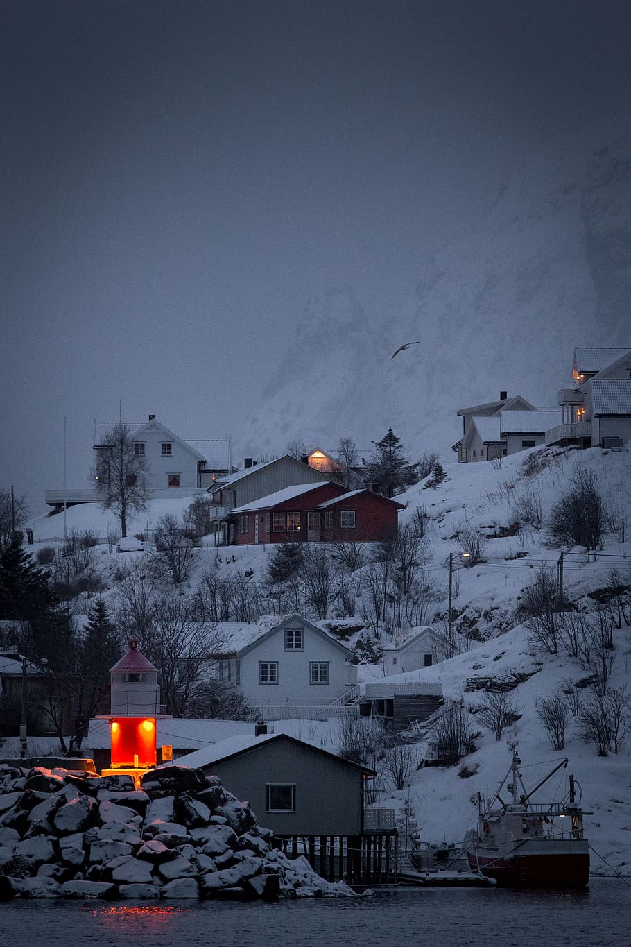 tower with orange light on village covered with snow, building HD wallpaper