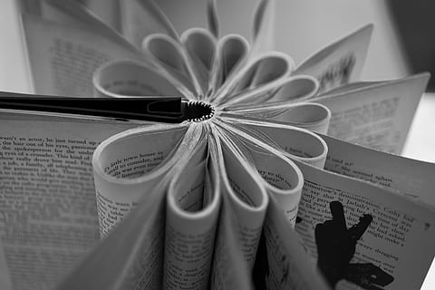 person, human, book, text, pattern, furniture, tabletop, page HD wallpaper