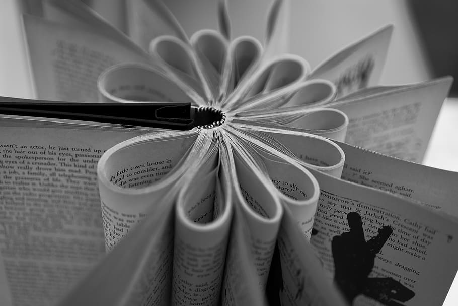 person, human, book, text, pattern, furniture, tabletop, page HD wallpaper