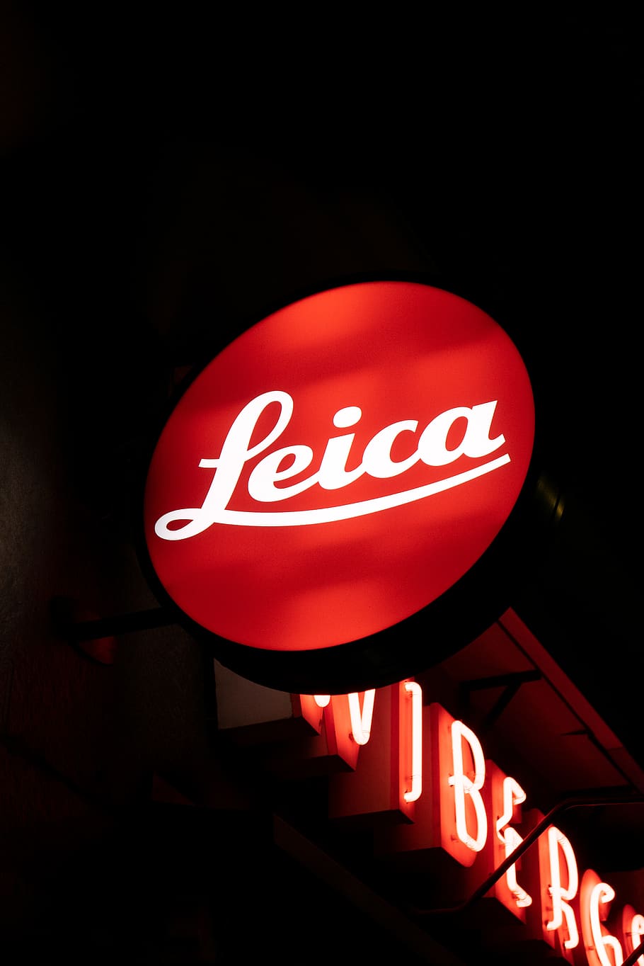 turned-on Leica signage, light, symbol, neon, sweden, stockholm