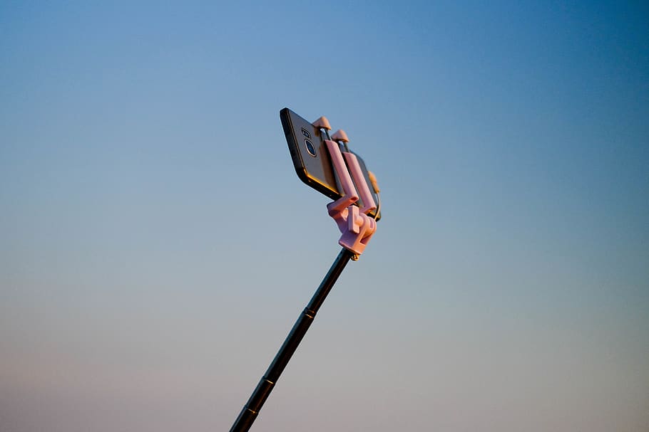 smartphone on monopod, sunset, selfie, camera, tech, stick, selfie stick HD wallpaper